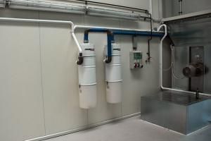 Centralni sistem  za suvo usisavanje u servisno-mehaničkim radionicama u Ljubljani.